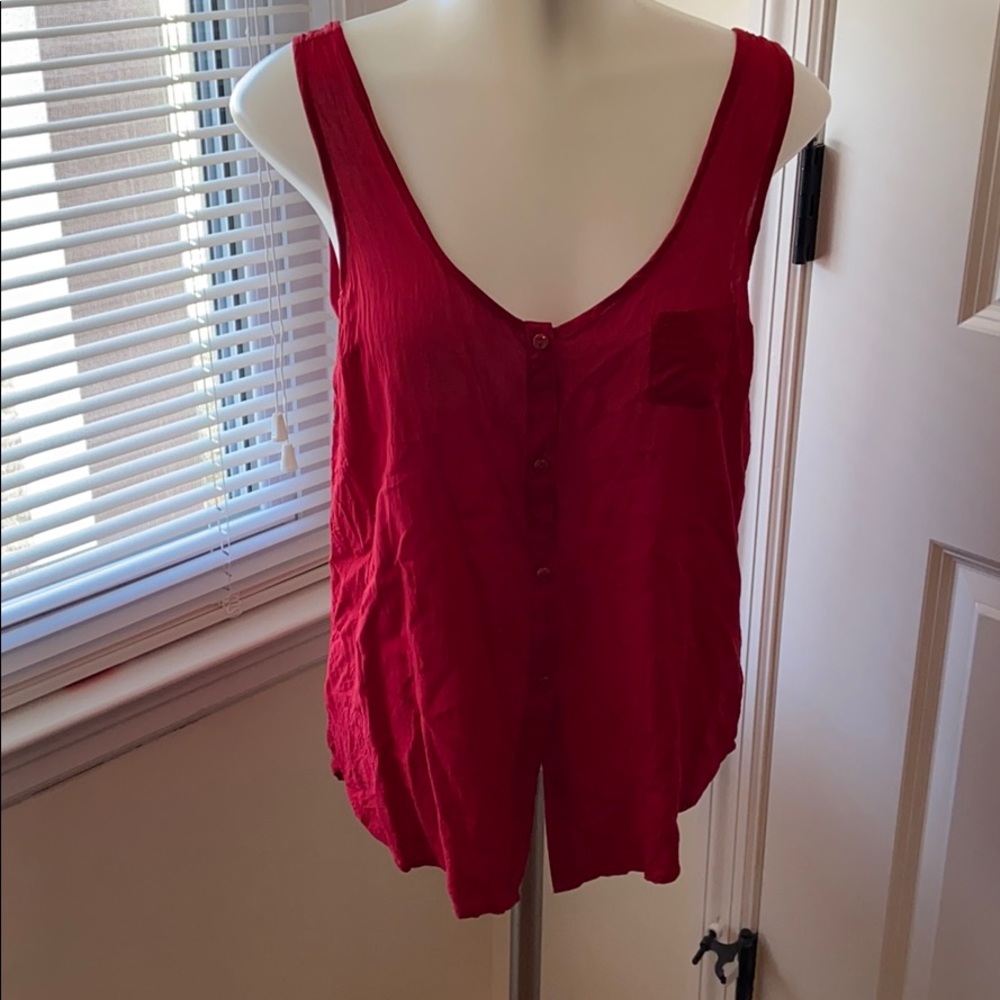 Woman’s red tank top